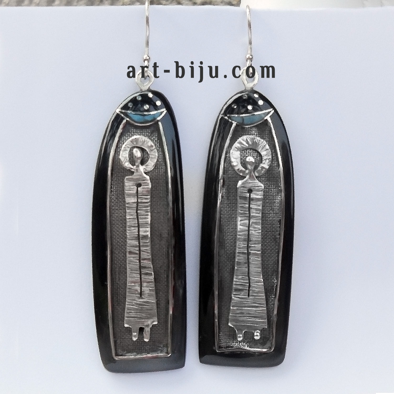 Boucles d'oreilles en argent avec turquoise.