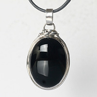 Сребърен медальон с черен оникс